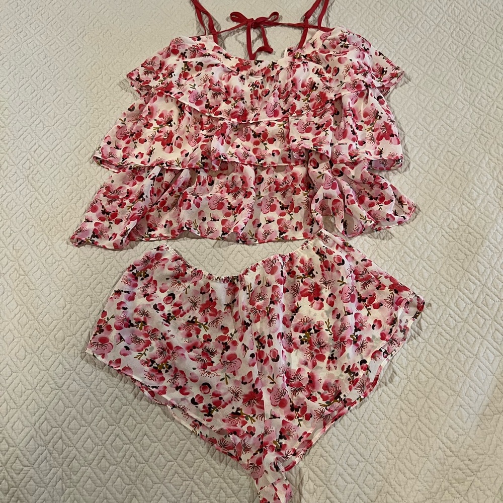 Lingerie Ruffle layers, cut out back with cheeky shorts to match.